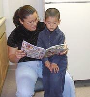Mom and son reading.